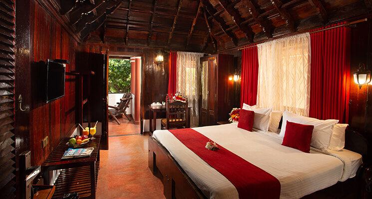 Akanta Ayurveda & Yoga Cherai bedroom with traditional design and peaceful ambiance in Kerala